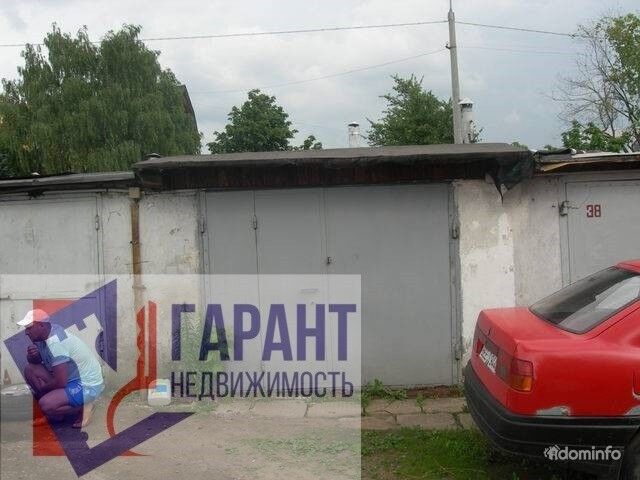 Срочно продается отличный гараж в оживленном районе Минска. Железные ворота, крыша перекрыта 2 года назад, яма, погреб, стеллажи. — фото 1