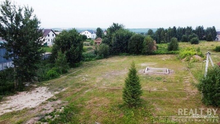 ​Продается ровный земельный участок 1,5 км от г. Смолевичи, 35 км от МКАД в д. Черниковщина на ул. Аэродромной. — фото 1